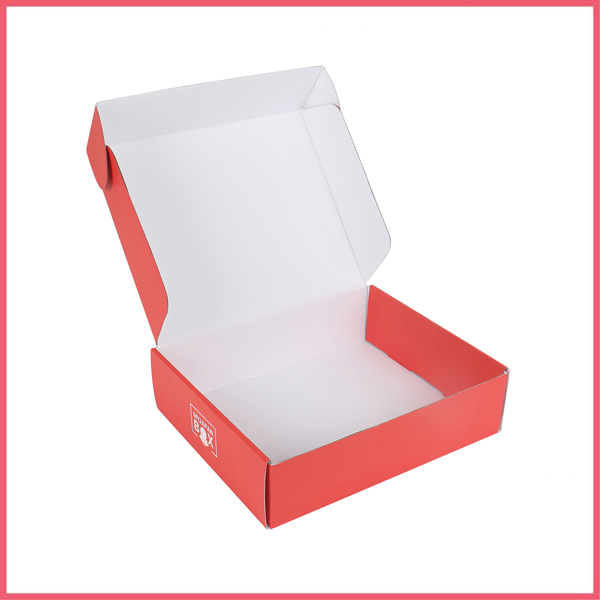 Red Corrugated Shipping Box With White Inner Paper